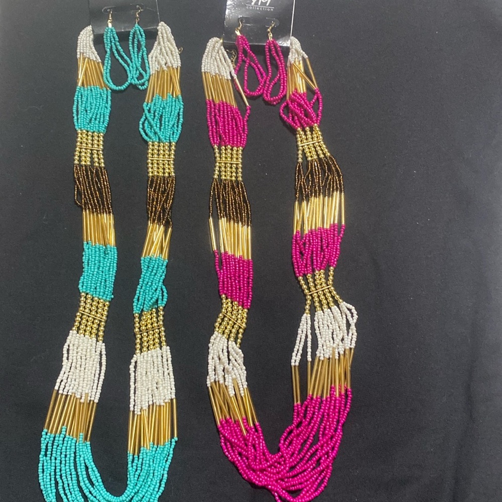 Brand new necklace and earrings set. You will receive both sets.